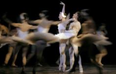 FILE - In this Sunday, Sept. 23, 2007 file photo, Ballet dancers Julio Bocca, right, and Alina Cojocaru perform Swan Lake in Buenos Aires, Argentina.